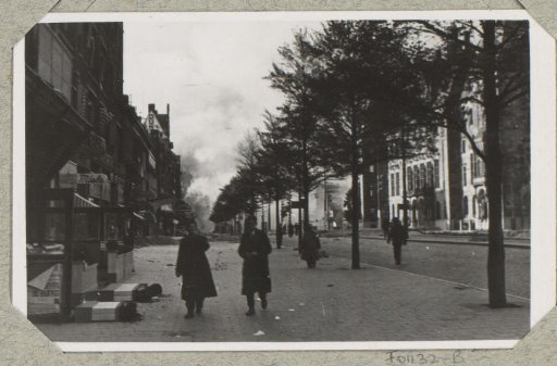 Street view of the Coolsingel with smoke clouds in the background