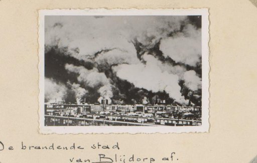 View of Rotterdam with smoke clouds over the city, seen from Blijdorp