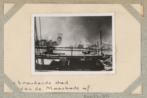 View of Rotterdam with smoke clouds near the Witte Huis, seen from the Maaskade