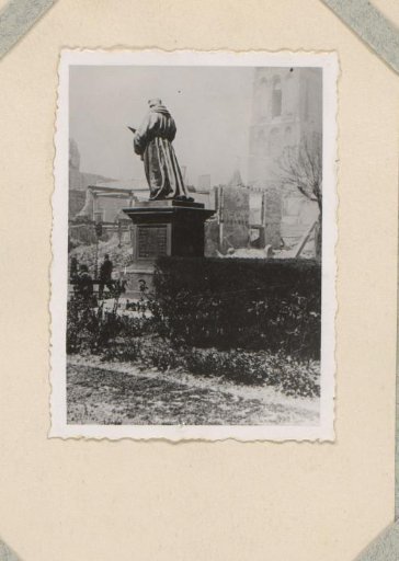Ruins around the Grote Markt with the statue of Erasmus