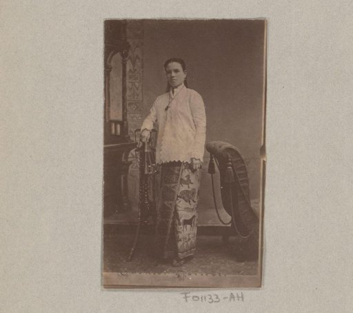 Photoreproduction of a carte-de-visite with portrait of a standing woman, dressed in Indian style