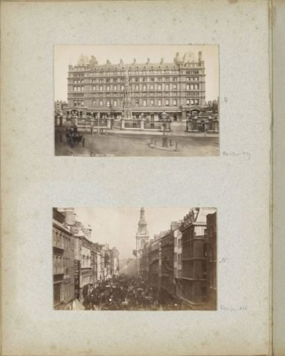 Charing Cross Station and Hotel with the replica of the Eleanor Cross in front in London