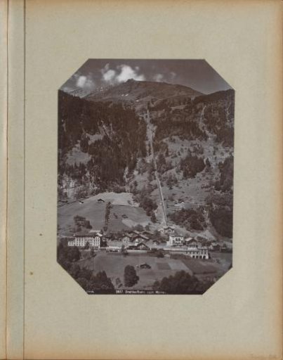 View of Mürren with station, cable car, and surrounding mountains