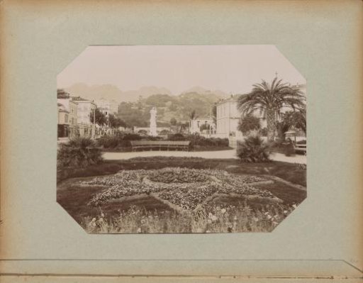 Garden (now Avenue de Verdun) in Menton with a statue commemorating the annexation to France