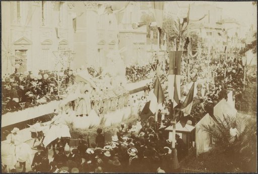 Parade with spectators and floats, possibly in Menton