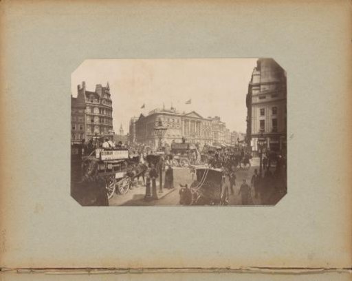 London Pavilion and horse-drawn carriages advertising the German Exhibition on Piccadilly Circus in London