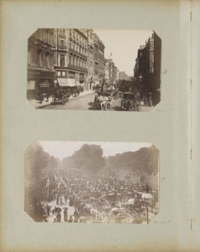 Street scene in Piccadilly in London with horse-drawn carriages, carts, and St James's Hall