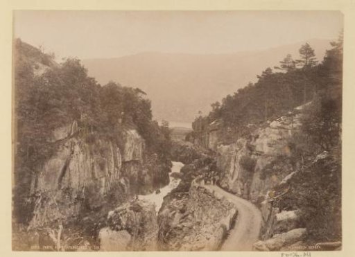 Gorge in the Brattland Valley in Norway with man and cart