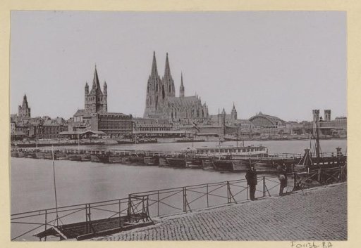 View of Cologne over the Rhine with the Great St. Martin's Church on the left and the Cologne Cathedral on the right