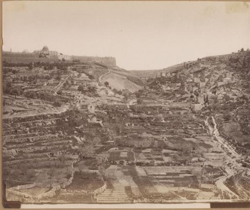 Former travel album with photographs of monuments and views from Spain, France, Portugal and Palestine