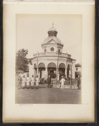 Police officers in front of the Tanjong Pagar police station in Singapore