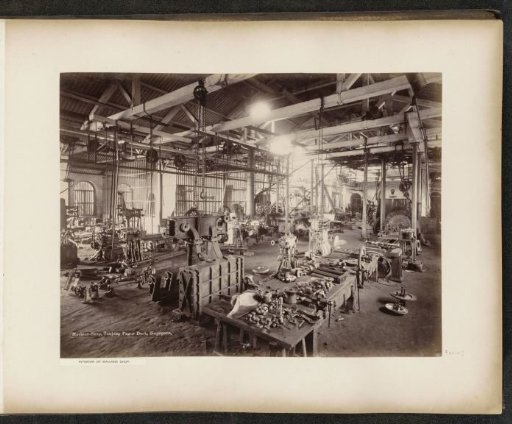 Interior of the engine house with workbenches of the Tanjong Pagar Dock Co. Ltd. in Singapore