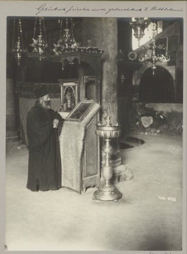 Greek Orthodox priest in the Church of the Nativity in Bethlehem