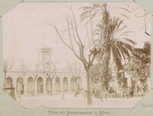 Place du Gouvernement in Bône, Algeria, with children, buildings, and trees