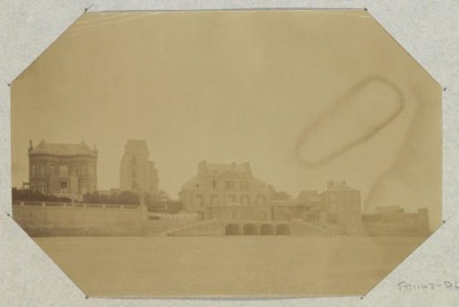 View of villas, possibly on a coast or shore in France