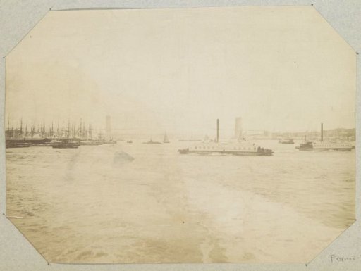 View of (probably) the East River in New York with ferries and the Brooklyn Bridge
