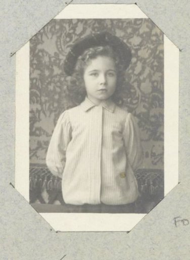 Portrait of a young child with a cap, probably in France