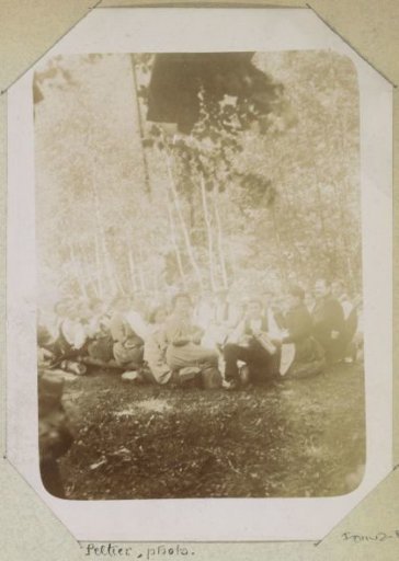 Company during a picnic in the forest, probably in France