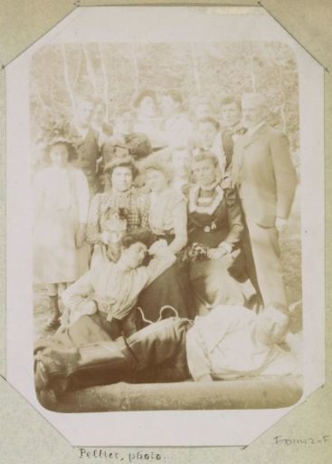 Group portrait of a company in a forest, probably in France