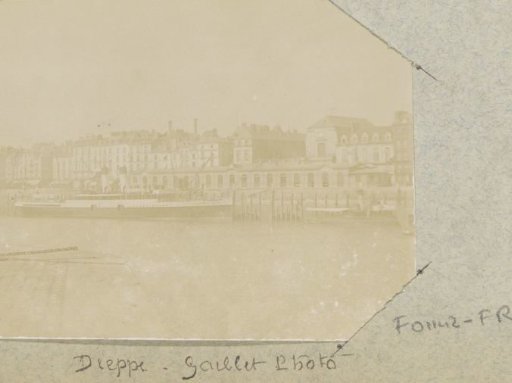 View of a quay in Dieppe with houses and ships