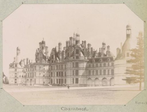 Exterior of the Château of Chambord with a man in front of it