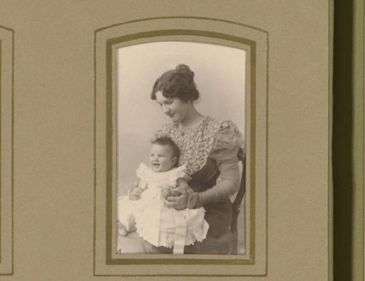 Portrait of a woman with a baby on her lap