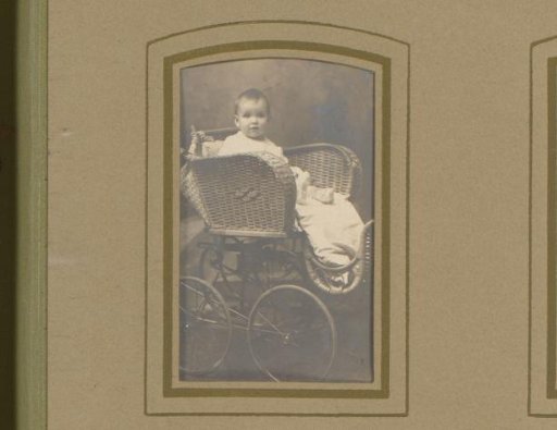 Portrait of a baby in a pram