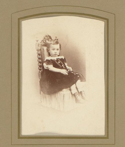 Portrait of a girl on a chair