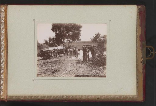 Men with an ox wagon stuck in the mud near Pretoria