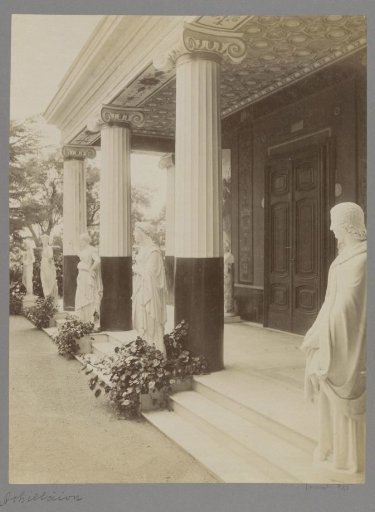 Gallery of statues with ivy and palms at the Achilleion on Corfu