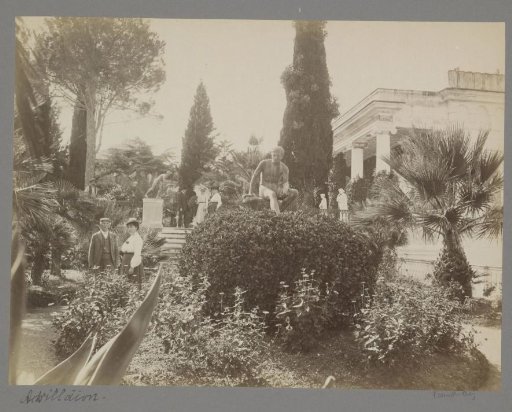 Men and women in the garden of the Achilleion on Corfu