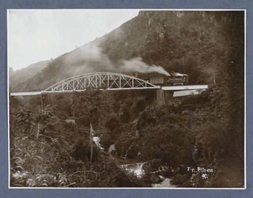 Train on a railway bridge at Titi Paja Kombo on Sumatra