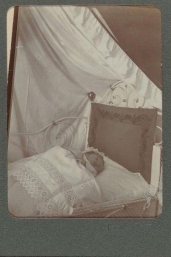 Baby sleeping in a cradle
