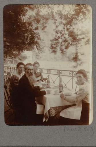 A party dining on a terrace