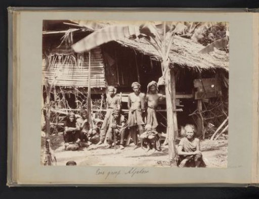 Group of Atjeh people in front of a house