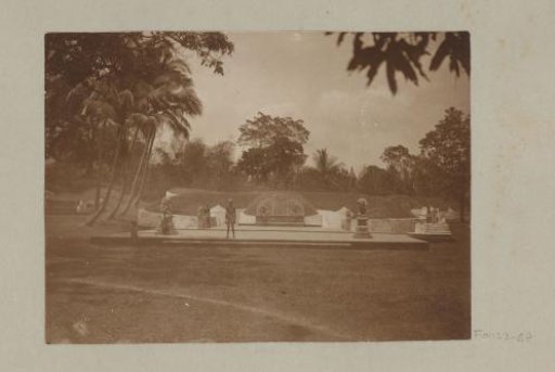 Indonesian men at a monument