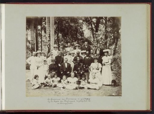Group portrait of Governor Warmolt Tonckens with company during a visit of Maroons, on the occasion of the Coronation Festivals in Suriname in 1898