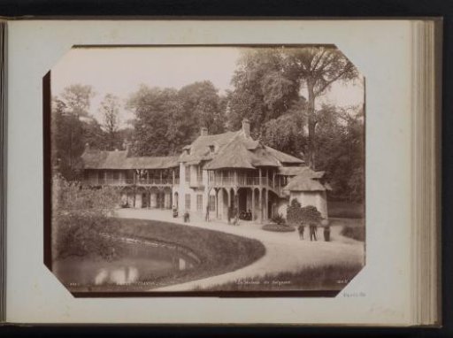 View of Le hameau de la Reine in the gardens of the Palace of Versailles