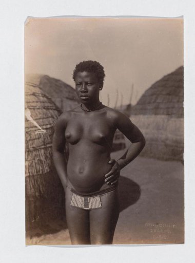 Portrait of a Zulu woman with a beaded belt in Natal