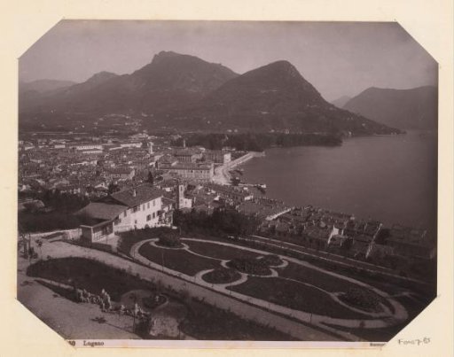 View of Lugano with mountains in the background and Lake Lugano