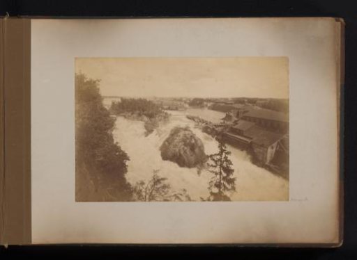 View of factories along a waterfall in Scandinavia
