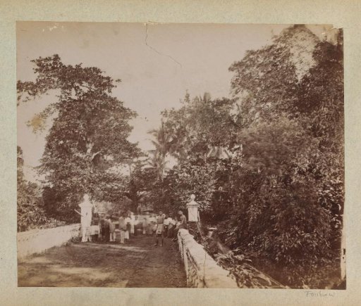 Group of boys and girls on an avenue, possibly in the Philippines