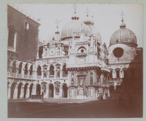 Courtyard of the Doge's Palace in Venice with the domes of San Marco in the background