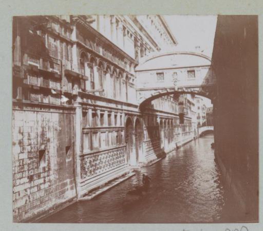 Bridge of Sighs in Venice with the Doge's Palace on the left