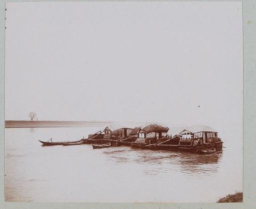 Houseboats, presumably on a waterway in Italy