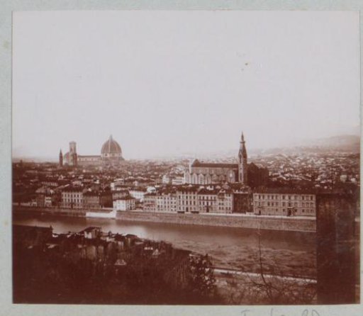 View of Florence with the Cathedral of Florence on the left horizon and the Basilica di Santa Croce in the foreground