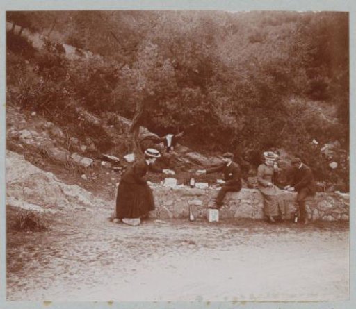 Two Women and Two Men Picnicking by the Side of the Road, Probably on Corsica