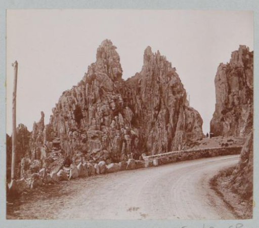 Road along rock formations, probably in Corsica