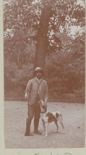 Portrait of a hunter with a rifle and a dog, probably in Italy or France