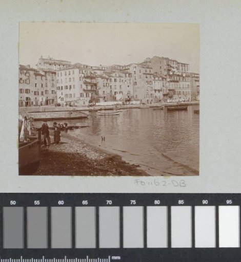 View of the harbor of Bastia with boats, working women, and drying laundry